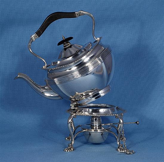 A silver kettle on stand, Height 11 ½”/290mm Width: 9”/230mm Weight 42.8oz/1213g.